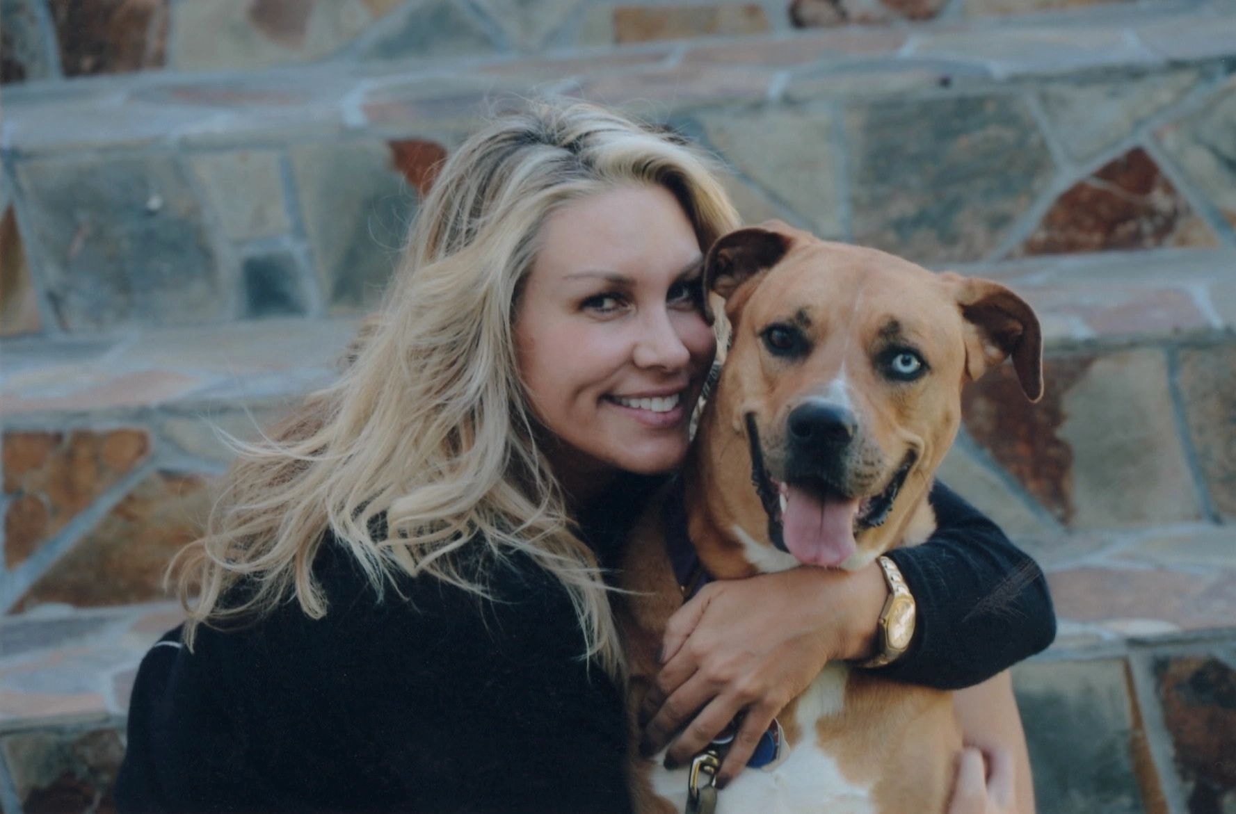 Woman hugging a rescue dog